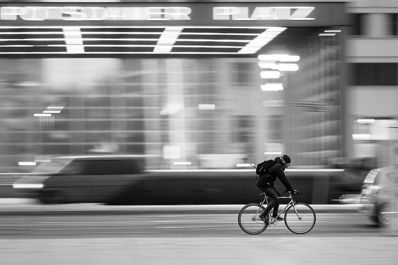 man cycling at at speed